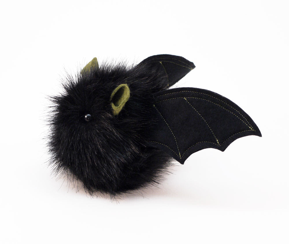 Fang the green eared black bat stuffed animal plush toy side view.