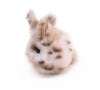 Peanut the tan and white spotted bunny stuffed animal plush toy side view.
