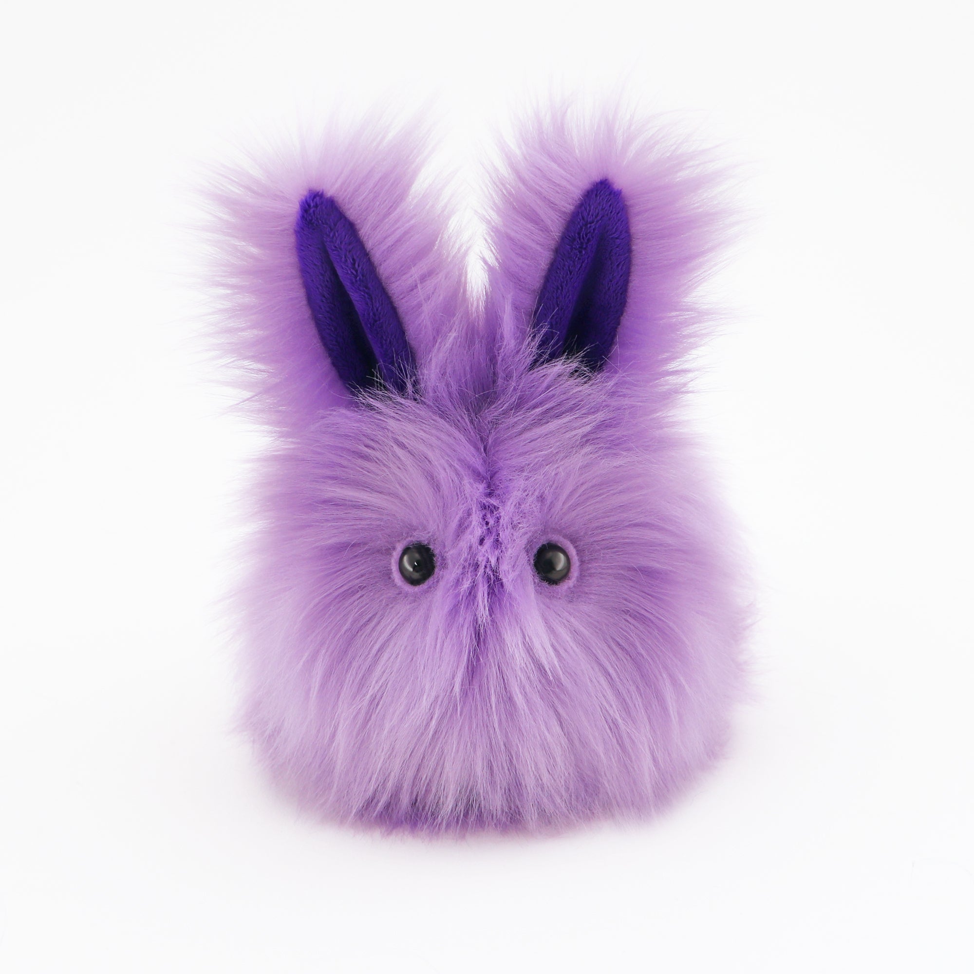 Lavender the Easter bunny plush toy, front view.