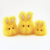 Sunny the Easter bunny plush toy, group view.