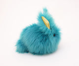 Breeze the aqua blue bunny stuffed animal plush toy side view.